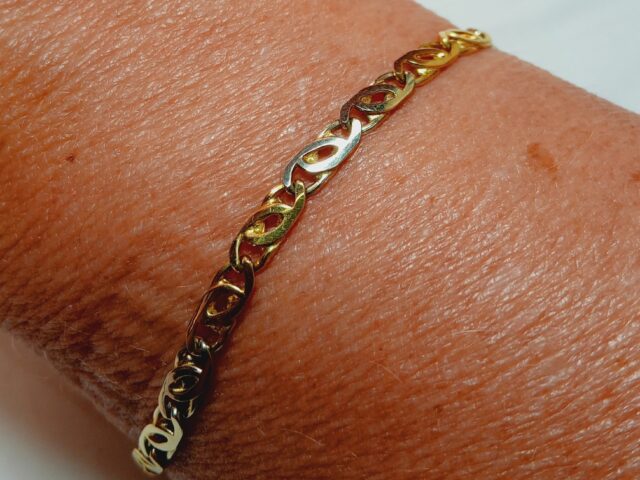 Bracelet maille plate entrelacée or jaune 18 carats