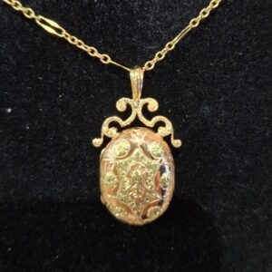 Pendentif ouvrant 2 ors 18 carats