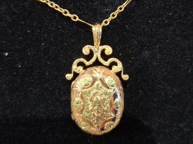 Pendentif ouvrant 2 ors 18 carats